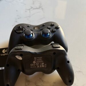 Logitech Black Wireless Game Controller with Blue Thumbstick Rings